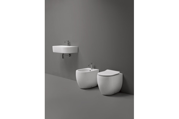 Унитаз приставной Kerasan Flo 311801 белый, овальный, антивсплеск, 37x56 см